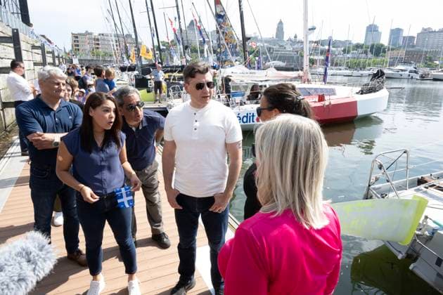June 24, 2024, Quebec, Pq, Canada: Conservative Leader Pierre Poilievre, centre, and his wife Anaida, left, chat with participants of the Quebec-Saint-Malo France transit race while touring Quebec for the Fete nationale, in Quebec City, Monday, June 24, 2024. MPs Gerard Deltell, behind left, and Pierre Paul-Hus, centre behind, look on Quebec Canada  - ZUMAc35_ 20240624_zaf_c35_038 Copyright: xJacquesxBoissinotx