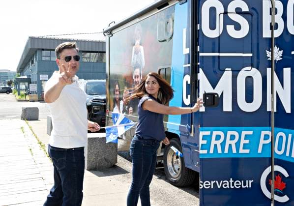 June 24, 2024, Quebec, Pq, Canada: Conservative Leader Pierre Poilievre waves as he and his wife Anaida leave after a visit at the Old Port as part of his tour for the Fete nationale, in Quebec City, Monday, June 24, 2024. Quebec Canada  - ZUMAc35_ 20240624_zaf_c35_045 Copyright: xJacquesxBoissinotx