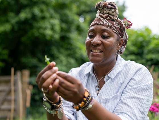 Woman holding produce from garden model released Copyright: xCulturaxCreativex