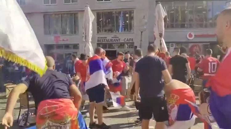VIDEO: Serbian footy thugs lob beer bottles at German cops in ugly Euro 2024 scenes Story from Jam Press (Serbian Fans Throw Bottles) Pictured: A video grab of Serbian football thugs lobbing beer bottles at German riot cops. VIDEO: Serbian footy thugs lob beer bottles at German cops in ugly Euro 2024 scenes Serbian football thugs lobbed beer bottles at German riot cops in ugly scenes at Euro 2024. A mob of supporters targeted the police officers in the main square in Munich. It was ahead of their match last (25 Jun) night with Denmark that ended 0-0. Serbia, in Group C along with England, were knocked out after finishing bottom. Some of their fans were topless, while others were clad in their football shirts and draped in their nati  Copyright: xJamxPressxVid @footbalIfights