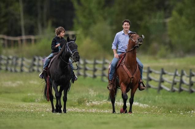 June 26, 2024, Nemaiah Valley, Bc, CANADA: Prime Minister Justin Trudeau and his son Hadrien, 10, ride horses while attending community celebrations to mark the 10th anniversary of the Tsilhqot in decision, in Nemaiah Valley, B.C., on Wednesday, June 26, 2024. In 2014, the Supreme Court of Canada granted Tsilhqot in aboriginal title to more than 1,750 square kilometres of land in the Nemaiah Valley. Nemaiah Valley CANADA - ZUMAc35_ 20240626_zaf_c35_129 Copyright: xDarrylxDyckx