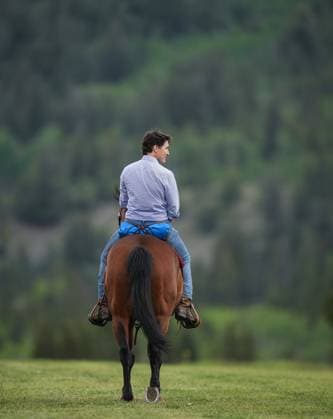 June 26, 2024, Nemaiah Valley, Bc, CANADA: Prime Minister Justin Trudeau rides a horse while attending community celebrations to mark the 10th anniversary of the Tsilhqot in decision, in Nemaiah Valley, B.C., on Wednesday, June 26, 2024. In 2014, the Supreme Court of Canada granted Tsilhqot in aboriginal title to more than 1,750 square kilometres of land in the Nemaiah Valley. Nemaiah Valley CANADA - ZUMAc35_ 20240626_zaf_c35_131 Copyright: xDarrylxDyckx