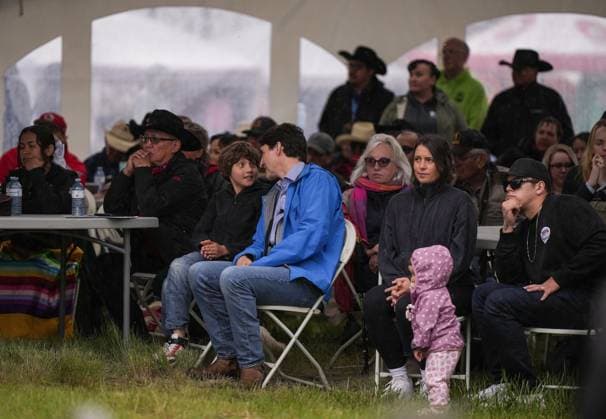 June 26, 2024, Nemaiah Valley, Bc, CANADA: Prime Minister Justin Trudeau and his son Hadrien, 10, sit together during community celebrations to mark the 10th anniversary of the Tsilhqot in decision, in Nemaiah Valley, B.C., on Wednesday, June 26, 2024. In 2014, the Supreme Court of Canada granted Tsilhqot in aboriginal title to more than 1,750 square kilometres of land in the Nemaiah Valley. Nemaiah Valley CANADA - ZUMAc35_ 20240626_zaf_c35_155 Copyright: xDarrylxDyckx