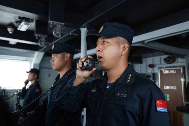 (240627) -- GUANGZHOU, June 27, 2024 -- A Chinese sailor gives order during the 36th joint patrol of Chinese and Vietnamese navies in Beibu Gulf in the South China Sea, June 26, 2024. The Chinese and Vietnamese navies concluded their 36th joint patrol in the Beibu Gulf on Thursday. The two sides each sent two vessels for the two-day patrol. The Chinese navy dispatched the two vessels Tongling and Hanzhong. The patrol, a routine activity in line with an agreement signed by the two countries in 2005, aims to deepen the comprehensive strategic cooperative partnership between the two countries. (Photo by Xinhua) CHINA-VIETNAM-NAVIES-JOINT PATROL-CONCLUSION (CN) TongxJiajun 