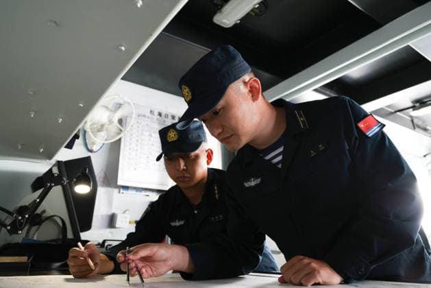 (240627) -- GUANGZHOU, June 27, 2024 -- Chinese sailors make a search plan during the 36th joint patrol of Chinese and Vietnamese navies in Beibu Gulf in the South China Sea, June 26, 2024. The Chinese and Vietnamese navies concluded their 36th joint patrol in the Beibu Gulf on Thursday. The two sides each sent two vessels for the two-day patrol. The Chinese navy dispatched the two vessels Tongling and Hanzhong. The patrol, a routine activity in line with an agreement signed by the two countries in 2005, aims to deepen the comprehensive strategic cooperative partnership between the two countries. (Photo by Xinhua) CHINA-VIETNAM-NAVIES-JOINT PATROL-CONCLUSION (CN) TongxJiajun 