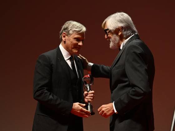 Opening ceremony of the 58th Karlovy Vary International Film Festival was held on June 28, 2024, in Karlovy Vary, Czech Republic. American actor Viggo Mortensen, left, receives the President s Award by festival president Jiri Bartoska, right. (CTKxPhoto KaterinaxSulova) CTKPhotoP2024062808179  CTKPhotoP2024062808179