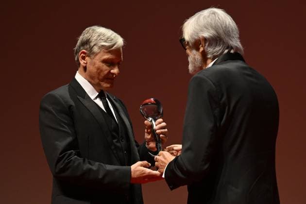 Opening ceremony of the 58th Karlovy Vary International Film Festival was held on June 28, 2024, in Karlovy Vary, Czech Republic. American actor Viggo Mortensen, left, receives the President s Award by festival president Jiri Bartoska, right. (CTKxPhoto KaterinaxSulova) CTKPhotoP2024062808193  CTKPhotoP2024062808193