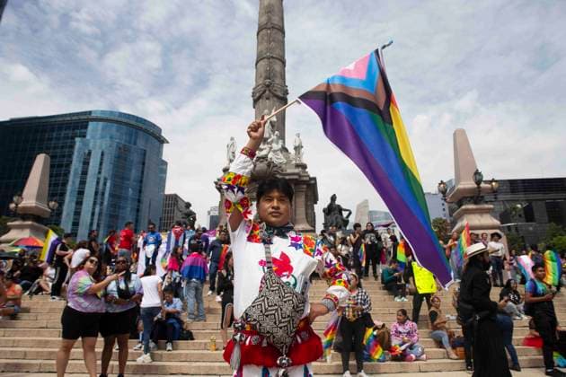 June 29, 2024, Mexico City, Mexico City, Mexico: Citizen of an indigenous people of Mexico participating in traditional dress at the foot of the Angel de la Independencia during the pride march in Mexico City. Mexico City Mexico - ZUMAs310 20240629_zip_s310_005 Copyright: xLuisxExSalgadox