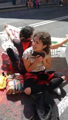 BOLOGNA - THE TOUR DE FRANCE BLOCKED IN SUPPORT OF YOUNG PALESTINIANS, AGAINST the sportwhasing of Israel Premier Tech, the Israeli team participating in the Tuor. This afternoon, five people adhering to the Latest Generation Repair Fund campaign occupied the road under the bridge of the Mazzini station, sitting down, chaining themselves together and pouring red paint on themselves and on the street, to symbolize blood Editorial Usage Only  Copyright: xUltimaxGenerazione Fotogrammax xIPAx Agenzia_Fotogramma_FGR4130915