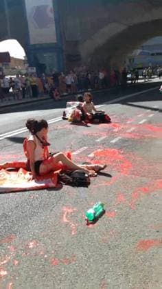 BOLOGNA - THE TOUR DE FRANCE BLOCKED IN SUPPORT OF YOUNG PALESTINIANS, AGAINST the sportwhasing of Israel Premier Tech, the Israeli team participating in the Tuor. This afternoon, five people adhering to the Latest Generation Repair Fund campaign occupied the road under the bridge of the Mazzini station, sitting down, chaining themselves together and pouring red paint on themselves and on the street, to symbolize blood Editorial Usage Only  Copyright: xUltimaxGenerazione Fotogrammax xIPAx Agenzia_Fotogramma_FGR4130905