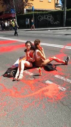 BOLOGNA - THE TOUR DE FRANCE BLOCKED IN SUPPORT OF YOUNG PALESTINIANS, AGAINST the sportwhasing of Israel Premier Tech, the Israeli team participating in the Tuor. This afternoon, five people adhering to the Latest Generation Repair Fund campaign occupied the road under the bridge of the Mazzini station, sitting down, chaining themselves together and pouring red paint on themselves and on the street, to symbolize blood Editorial Usage Only  Copyright: xUltimaxGenerazione Fotogrammax xIPAx Agenzia_Fotogramma_FGR4130906