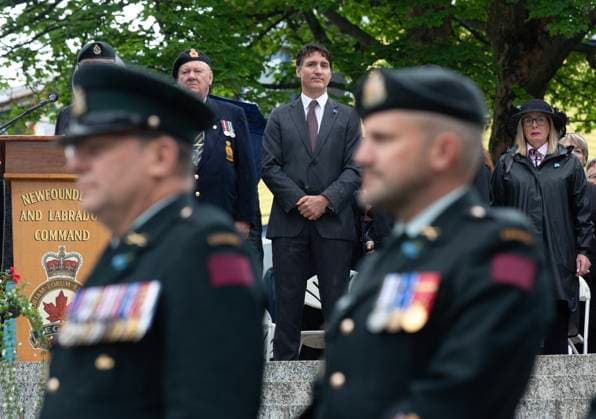 July 1, 2024, St. John s, Nl, Canada: Prime Minister Justin Trudeau watches as an unknown First World War Newfoundland and Labrador soldier is interned at the National War Memorial in St. John s on Monday, July 1, 2024. St. John s Canada  - ZUMAc35_ 20240701_zaf_c35_014 Copyright: xPaulxDalyx