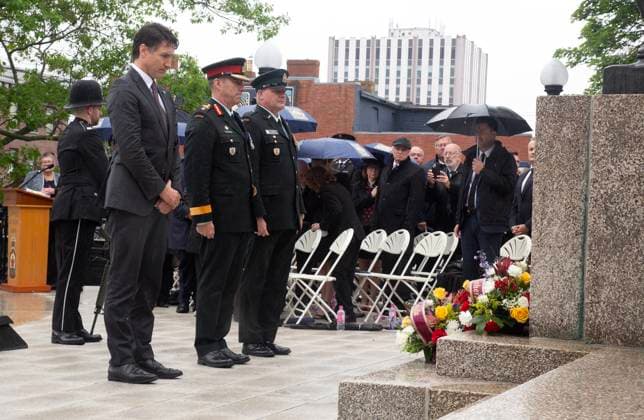 July 1, 2024, St. John s, Nl, Canada: Prime Minister Pierre Trudeau (left to right), Major General Paul Peyton, and Chief Warrant Officer Bob McCann attend the wreath laying as an unknown First World War Newfoundland and Labrador soldier is interned at the National War Memorial in St. John s on Monday, July 1, 2024. St. John s Canada  - ZUMAc35_ 20240701_zaf_c35_022 Copyright: xPaulxDalyx