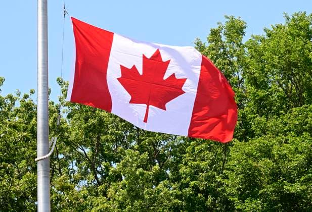 July 1, 2024, Quebec, Pq, Canada: The Canadian flag os raised during Canada Day celebrations on the Dufferin Terrasse in front of the Chateau Frontenac, Monday, July 1, 2024 in Quebec City. Quebec Canada  - ZUMAc35_ 20240701_zaf_c35_043 Copyright: xJacquesxBoissinotx