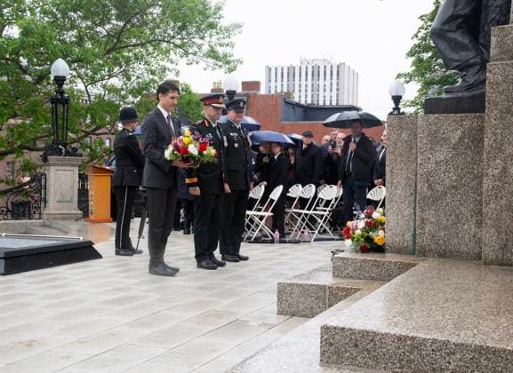 July 1, 2024, St. John s, Nl, Canada: Prime Minister Pierre Trudeau (left to right), Major General Paul Peyton, and Chief Warrant Officer Bob McCann attend the wreath laying as an unknown First World War Newfoundland and Labrador soldier is interned at the National War Memorial in St. John s on Monday, July 1, 2024. St. John s Canada  - ZUMAc35_ 20240701_zaf_c35_085 Copyright: xPaulxDalyx