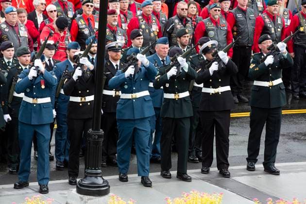 July 1, 2024, St. John s, Nl, Canada: A volley of three shots are fired during the lowering of the casket as an unknown First World War Newfoundland and Labrador soldier is interned at the National War Memorial in St. John s on Monday, July 1, 2024. St. John s Canada  - ZUMAc35_ 20240701_zaf_c35_086 Copyright: xPaulxDalyx