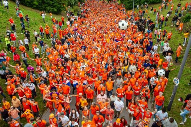 Thousands of cheerful Oranje fans march through the Olympic Park to the Fan Zone, Fan Walk, UEFA EURO 2024, Munich, 2 July 2024 Germany, Munich, 2 July 2024, Fan March of Dutch soccer fans to the Olympic Pa