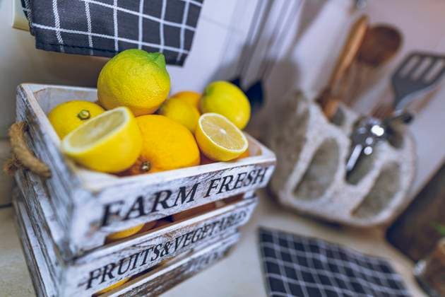 Kitchen Interior. Selective Focus on a Box with Fresh Ripe Lemons. Tasty Citrus Fruits for Lemonade. Home Life. Healthy Organic Nutrition.. Ripe Fresh Lemons on Kitchen ,model released, Symbolfoto