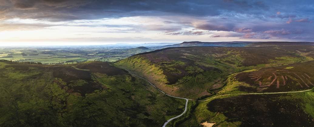 Panorama of Sunset over Cod Beck Reservoir from a drone, North York Moors National Park, North Yorkshire, England, United Kingdom, Europe *** Panorama of Sunset Over COD Beck Reservoir from a drone, North York Moors National Park, North Yorkshire, England, United Kingdom, Europe Copyright: imageBROKER MaciejxOlszewski ibxmao10914896.jpg