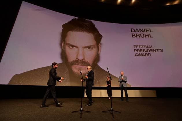 German actor, director and producer Daniel Bruhl (left), multiple winner of the European Film Award, presented the film Next Door in the Grand Hall of the Thermal Hotel and received the Award of the Karlovy Vary International Film Festival President from Jiri Bartoska at the 58th Karlovy Vary International Film Festival, in Karlovy Vary, Czech Republic, on July 4, 2024. (CTKxPhoto SlavomirxKubes) CTKPhotoP2024070404510  CTKPhotoP2024070404510