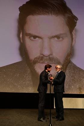 German actor, director and producer Daniel Bruhl (left), multiple winner of the European Film Award, presented the film Next Door in the Grand Hall of the Thermal Hotel and received the Award of the Karlovy Vary International Film Festival President from Jiri Bartoska at the 58th Karlovy Vary International Film Festival, in Karlovy Vary, Czech Republic, on July 4, 2024. (CTKxPhoto SlavomirxKubes) CTKPhotoP2024070404512  CTKPhotoP2024070404512