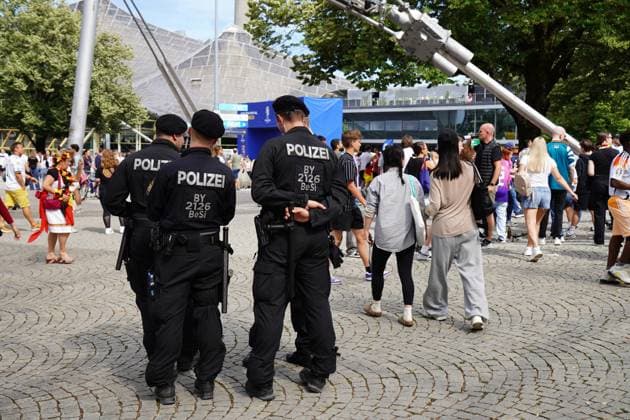 Munich, Bavaria, Germany - July 5, 2024: Public viewing in the fan zone in Munich s Olympiapark for the quarter-final of UEFA EURO 2024 Germany vs. Spain. The police are on site for the safety of football fans