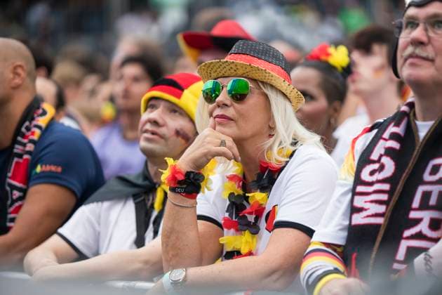 European Football Championship, fan zone at the Brandenburg Gate, Berlin, 05 07 2024 A woman watches the football match in the fan zone at the Brandenburg Gate during the quarter-final match between Germany and Spain at the European Football Championship, Berlin, 05 07 2024 Berlin fan zone Copyright: xBenxKriemannx
