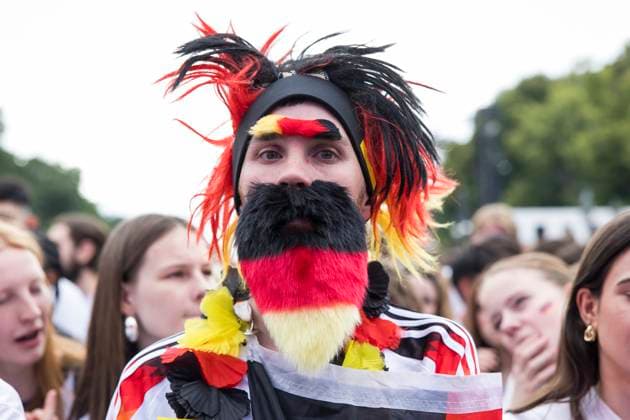European Football Championship, fan zone at the Brandenburg Gate, Berlin, 05 07 2024 Football fan in Germany outfit at the fan zone at the Brandenburg Gate during the quarter final match Germany Spain at the European Football Championship, Berlin, 05 07 2024 Berlin fan zone Copyright: xBenxKriemannx