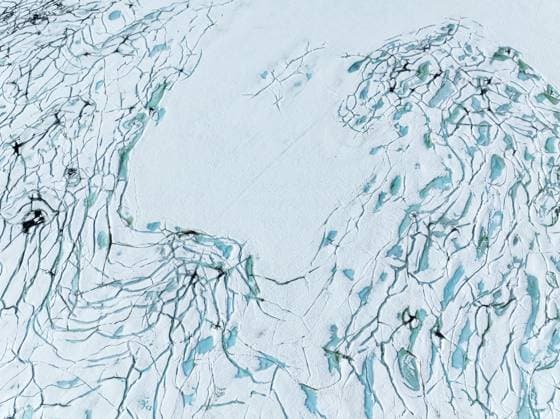 Creative Highlights World Aerial view of frozen lake Prestesteinsvatnet, melting snow creates small blue pools on the frozen surface, mountain crossing Sognefjellsvegen, Sognefjell, Norway, Europe *** Aerial View of Frozen Lake Prestesteinsvatnet, melting Snow creates Small Blue Pools ON The Frozen surface, Mountain Crossing Sognefjellsvegen, Sognefjell, Norway, Europe Copyright: imageBROKER AndreasxWerth iblawe10938715.jpg