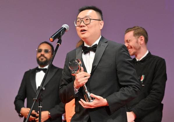 Chinese director Zhengfan Yang receives the Grand Prix of the Proxima Competition for his film The Stranger at the closing awards ceremony of the 58th Karlovy Vary International Film Festival, in Karlovy Vary, Czech Republic, on July 6, 2024. (CTKxPhoto OndrejxHajek) CTKPhotoP2024070604825  CTKPhotoP2024070604825
