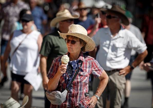 July 6, 2024, Calgary, Ab, CANADA: Visitors arrive at the Calgary Stampede sporting western duds in Calgary, Alta., Saturday, July 6, 2024. Calgary CANADA  - ZUMAc35_ 20240706_zaf_c35_005 Copyright: xJeffxMcintoshx