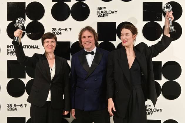 Norwegian director Lilja Ingolfsdottir, left, with the Special Jury Prize for her film To the Ages and Norwegian actress Helga Guren, right, with her Best Actress Award for the same film pose in front the photo wall after the closing awards ceremony of the 58th Karlovy Vary International Film Festival, in Karlovy Vary, Czech Republic, on July 6, 2024. (CTKxPhoto SlavomirxKubes) CTKPhotoP2024070605586  CTKPhotoP2024070605586