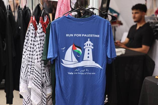 Support For Palestine In Toronto Amid The Israel Hamas Conflict A T-shirt is promoting the Run for Palestine as Muslim Canadians are showing solidarity for Gaza and Palestine amid the Israel-Hamas conflict at a small shop in Toronto, Ontario, Canada, on July 06, 2024. Toronto Canada  Copyright: xCreativexTouchxImagingxLtdx originalFilename: friedman-supportf240706_npRR4.jpg