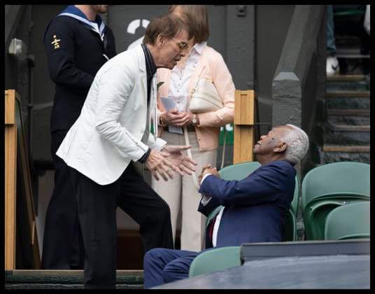 . 08 07 2024. London, United Kingdom. Sir Cliff Richard and Trevor McDonald on day eight of the Wimbledon Tennis Championships in London.  xStephenxLockx xi-Imagesx IIM-25360-0054