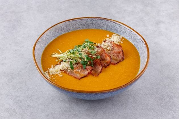 Red lentil soup puree on stone table. Top view. Red lentil soup puree on stone table. Top view Copyright: xZoonar.com AntonxVasiljevx 21876891