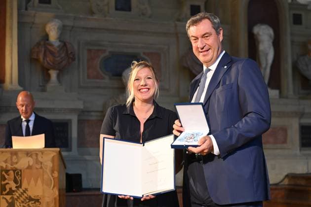 Claudia KORECK Singer,Songwriter , Markus SOEDER State Premier of Bavaria and CSU Chairman Award of the Bavarian Order of Merit in the Antiquariat of the Residence in Munich on 10 07 2024