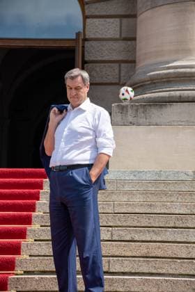 Munich, Bavaria, Germany - 11 July 2024: Prime Minister of Bavaria Dr. Markus Söder honoring the volunteers of the European Championship