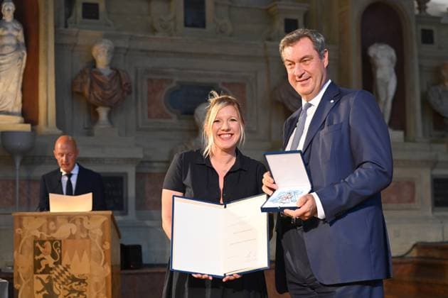 Claudia KORECK Singer Songwriter , Markus SOEDER State Premier of Bavaria and CSU Chairman Award of the Bavarian Order of Merit in the Antiquariat of the Residence in Munich on 10 07 2024