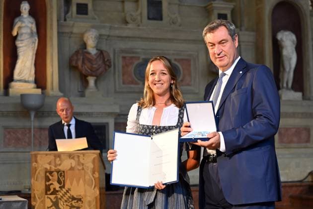 Franziska PREUSS Ex biathlete , Markus SOEDER State Premier of Bavaria and CSU Chairman Award of the Bavarian Order of Merit in the Antiquariat of the Residence in Munich on 10 07 2024