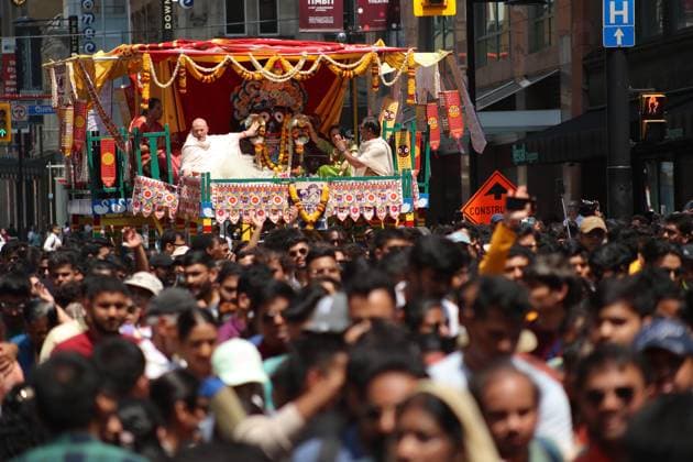 Lord Jagannath Grand Chariot Fest, Toronto Canada Devotees of Lord Jagannath are taking part in the procession of the Lord Jagannath Grand Chariot fest on Yonge Street in Downtown Toronto, Canada, on July 13, 2024. Toronto Canada  Copyright: xArrushxChoprax originalFilename: chopra-notitle240713_npW9y.jpg