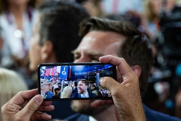 A person takes a photo on their phone as United States Senator JD Vance (Republican of Ohio) is officially nominated for the office of Vice President at the Republican National Convention in Milwaukee, Wisconsin at the Fiserv Forum on Monday, July 15, 2024. Copyright: xAnnabellexGordonx xCNPx MediaPunchx