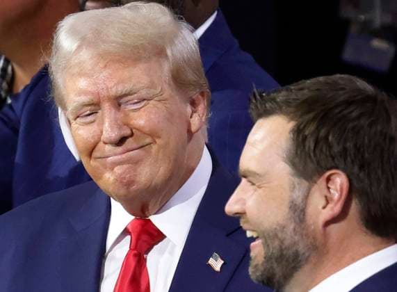 Former President and Republican Presidential candidate Donald Trump stands with Vice Presidential candidate Sen. J.D. Vance, R-OH, at the 2024 Republican National Convention at Fiserv Forum in Milwaukee, Wisconsin on Monday, July 15, 2024. The city of Milwaukee is hosting the 2024 Republican Convention which will run from July 15th through July 18th.  MIL20240715760 TANNENxMAURY