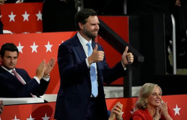 Vice Presidential nominee JD Vance greets the 2024 Republican National Convention at Fiserv Forum in Milwaukee, Wisconsin on Monday, July 15, 2024. The city of Milwaukee is hosting the 2024 Republican Convention which will run from July 15th through July 18th.  MIL2024071544 DAVIDxBANKS