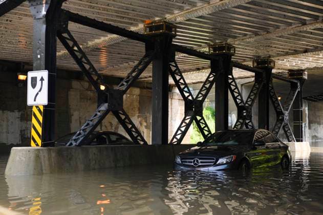 July 16, 2024, Toronto, On, Canada: Emergency services respond to submerged vehicles at an underpass at Parkside Drive and Lake Shore Blvd., after heavy rain caused flooding, in Toronto on Tuesday, July 16, 2024. Toronto Canada  - ZUMAc35_ 20240716_zaf_c35_043 Copyright: xChristopherxKatsarovx