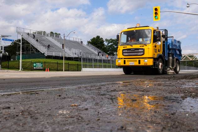 July 16, 2024, Toronto, On, Canada: City crews clean up debris on Lake Shore Blvd., after heavy rain caused flooding, in Toronto on Tuesday, July 16, 2024. Toronto Canada  - ZUMAc35_ 20240716_zaf_c35_089 Copyright: xChristopherxKatsarovx