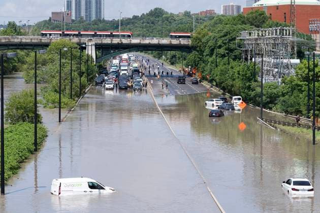 July 16, 2024, Toronto, On, Canada: Cars are partially submerged in flood waters in the Don Valley following heavy rain in Toronto, on Tuesday, July 16 2024. Toronto Canada  - ZUMAc35_ 20240716_zaf_c35_107 Copyright: xArlynxMcadoreyx