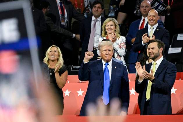 (L-R) Eric Trump, Rep. Marjorie Taylor Greene, R-GA, former President and Republican Presidential candidate Donald Trump, and Vice President nominee JD Vance attend the 2024 Republican National Convention at Fiserv Forum in Milwaukee, Wisconsin on Tuesday, July 16, 2024. The convention, which will run from July 15th through July 18th, takes place days after an attempted assassination of former President Donald Trump at a campaign rally in Pennsylvania on July 13.  MIL20240716332 MATTxMARTIN