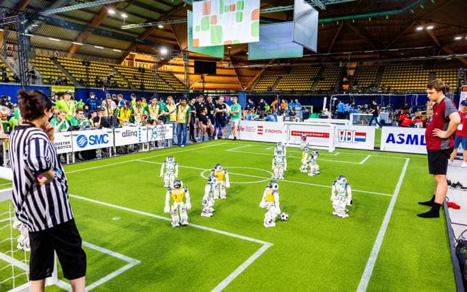 EINDHOVEN - Robot football during a practice day in the run-up to the World Cup for Robots: RoboCup 2024. Universities and technology companies from all over the world show what their robots can do in various disciplines. ANP IRIS VAN DEN BROEK netherlands out - belgium out  Copyright: xx x503649168x originalFilename: 503649168.jpg