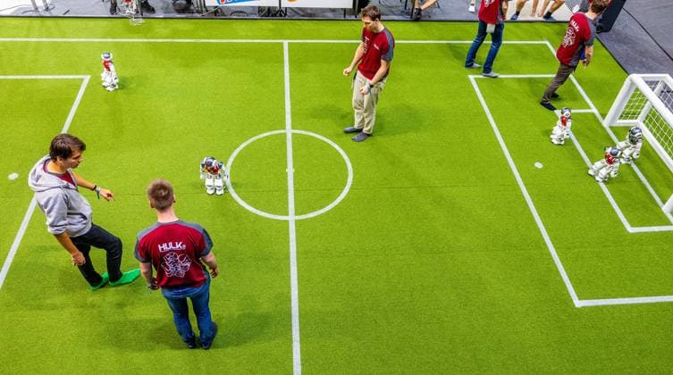 EINDHOVEN - Robot football during a practice day in the run-up to the World Cup for Robots: RoboCup 2024. Universities and technology companies from all over the world show what their robots can do in various disciplines. ANP IRIS VAN DEN BROEK netherlands out - belgium out  Copyright: xx x503649421x originalFilename: 503649421.jpg