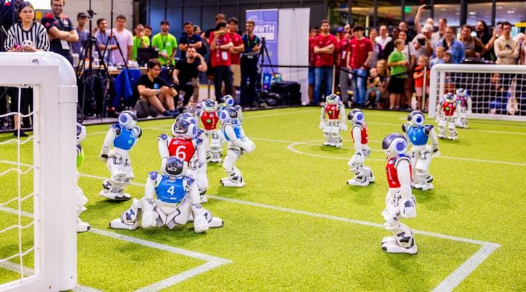 EINDHOVEN - Robot football during a practice day in the run-up to the World Cup for Robots: RoboCup 2024. Universities and technology companies from all over the world show what their robots can do in various disciplines. ANP IRIS VAN DEN BROEK netherlands out - belgium out  Copyright: xx x503649746x originalFilename: 503649746.jpg